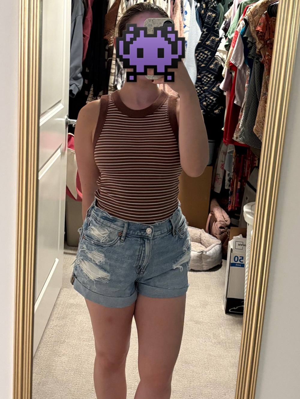 AE Strigid Super High-Waisted
Ripped Relaxed Denim Short | Size 2